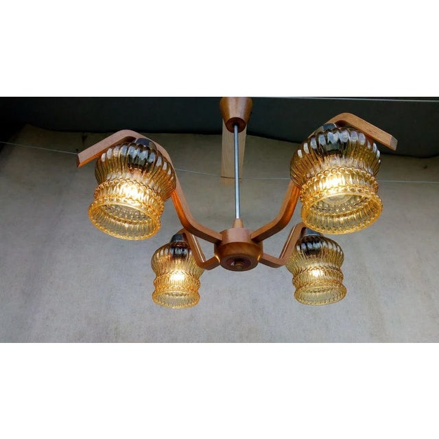 Material: wood, glass, metal. nice authentic retro vintage chandelier. Holder-metal, wood. 4 light elements, translucent...