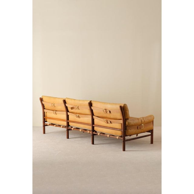 3-Seater sofa model Kontiki designed by Arne Norell in original brown leather. Produced by Arne Norell AB in Aneby,...