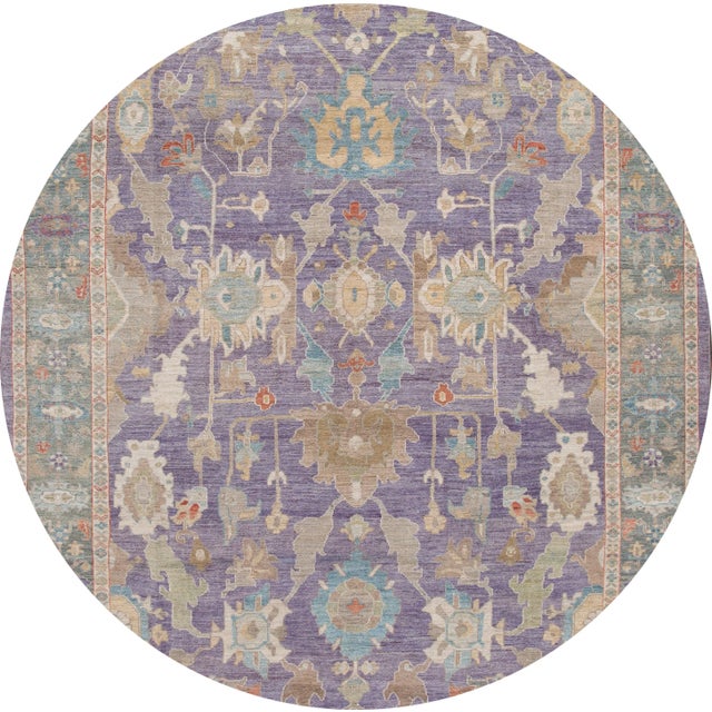 Beautiful contemporary Sultanabad rug, hand knotted wool with a purple field, blue frame, tan, brown and ivory accents in...