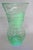 This beautiful Large Flared Vase is made out of vaseline/uranium glass. This stunning vase is a beautiful green color all...