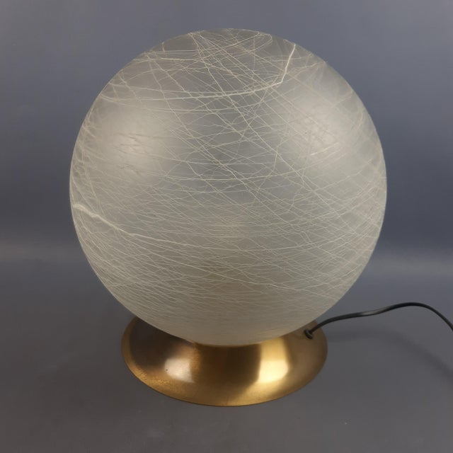 Beautiful large vintage table lamp, particular modernist design with Murano Venini glass bowl in relief, brass base,...