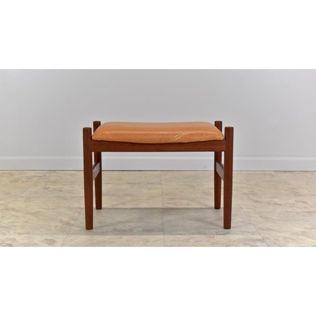 Danish ottoman/footstool attributed to Hugo Frandsen for Spottrup Mobelfabrik circa the 1960's (no makers mark present)....