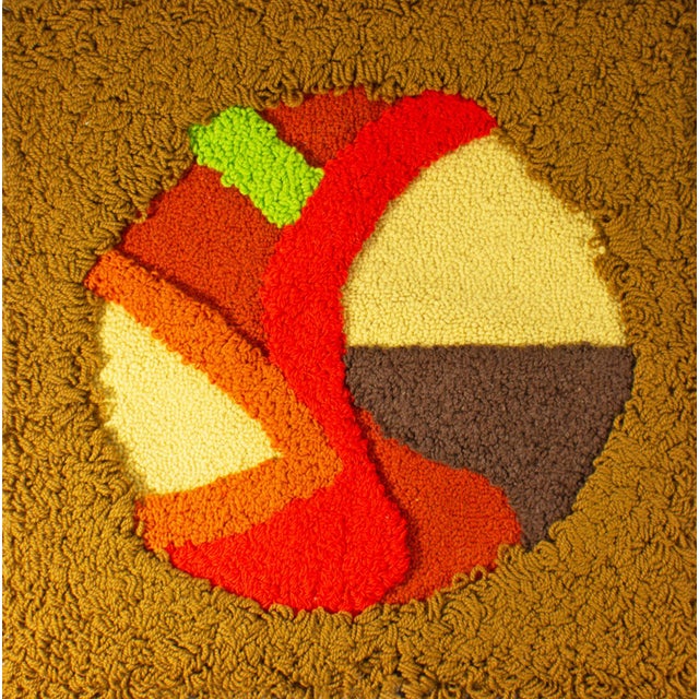 A 1976 wool tapestry by the American artist Harry Hilson (1935-2004). This work features a central circle biomorphic...