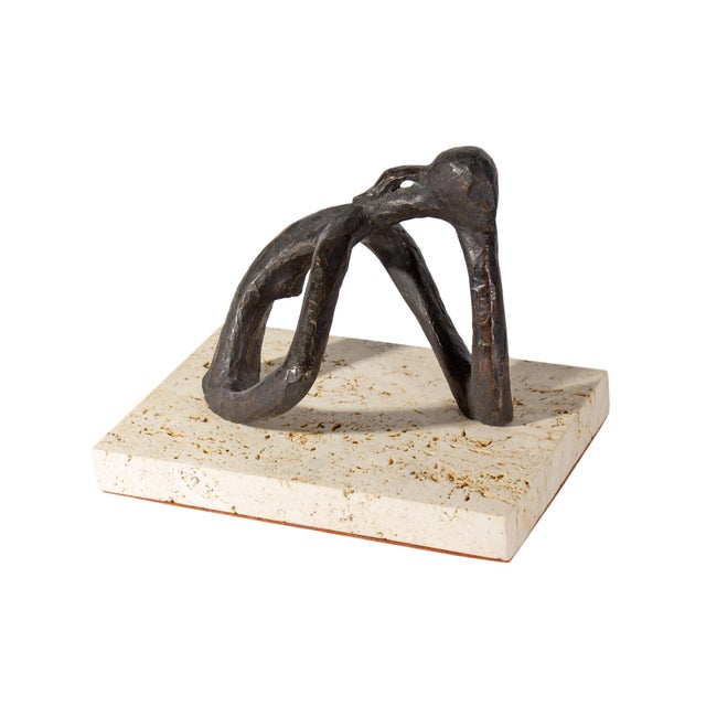 A sculpture by the American artist Walter Driesbach (1929-2015). This sculpture depicts an abstracted figure of a woman...