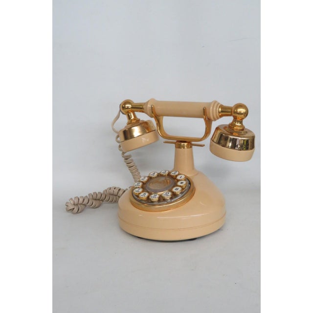 This amazing Push Button Rotary Phone is made of plastic and metal. This elegant decorator phone presents a gorgeous...