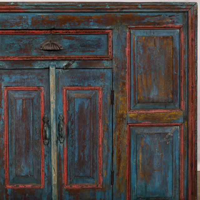 Antique Indian Painted Teakwood Buffet Cabinet, in a beautiful blue paint finish with the trim painted later in pink, and...