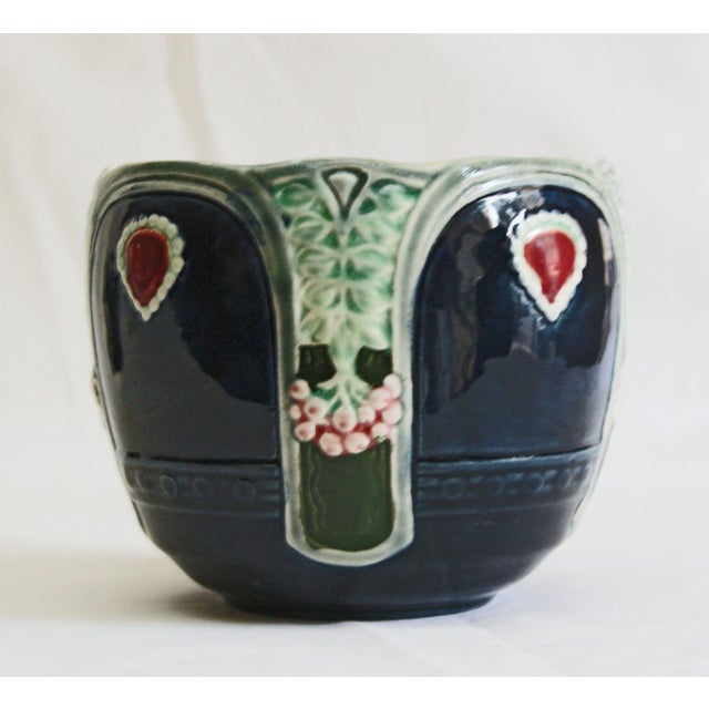 Pair of Ceramic Flower Pots 2 Art Nouveau flower pots. Dark blue glazed. Decorated all around with floral and geometric...