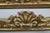19th century French gilt wood carvings with a center shell motif flanked by garlands of flowers.