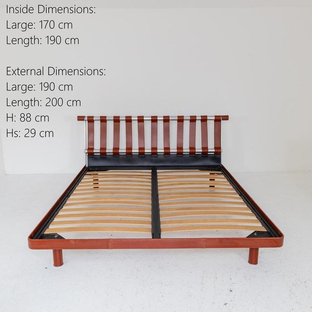 Description Double bed with bed frame and cylindrical legs upholstered in Bulgarian red leather. The headboard consists of...