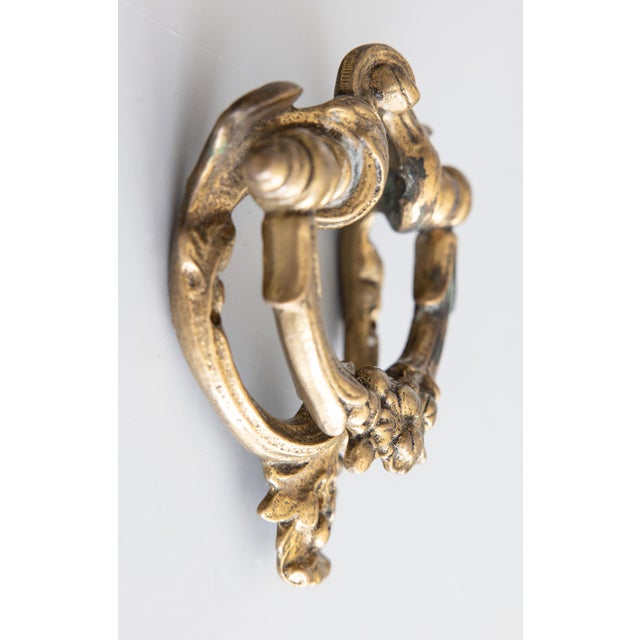 A gorgeous antique early 20th-Century Art Nouveau French gilt brass floral door knocker. This beautiful door knocker is...