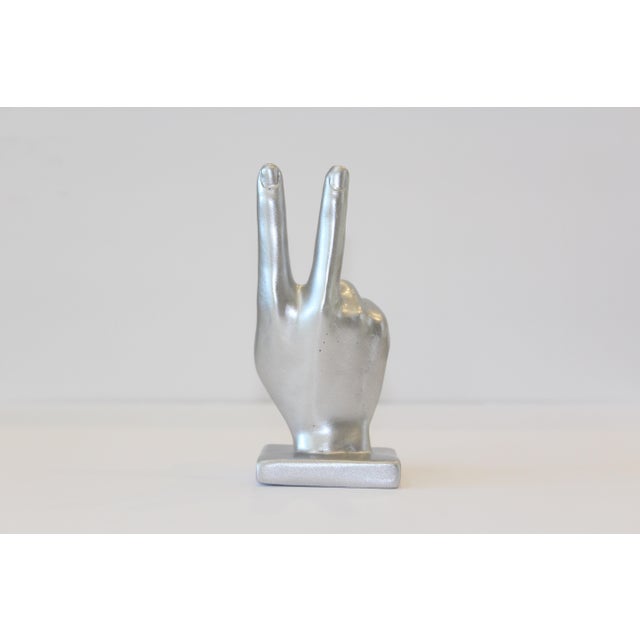 Invite the feeling of Zen to any space with this beautiful Peace Sign hand sculpture, crafted from high-quality resin....
