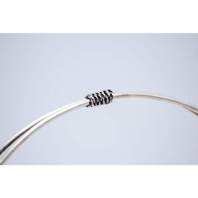 Circular Silver Fruit Bowl with Double Handle, in Very Good conditions. Designed 1890 to 1919 This piece has an...