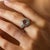 This exquisite Edwardian diamond cluster engagement ring from the 1910’s is a breathtaking example of antique romance and...