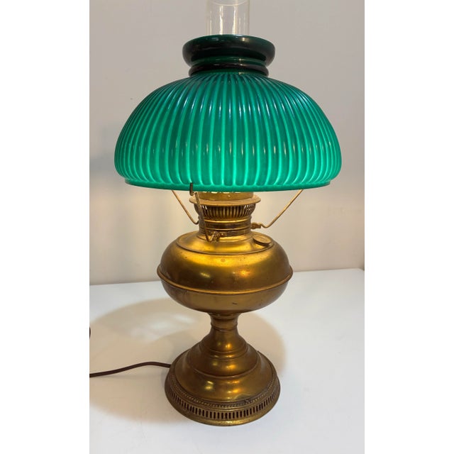 Antique Rayo Brass Oil Lamp with Emerald Green Ribbed Cased Shade. The gorgeous Victorian liight has been electrified,...