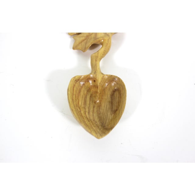 Vintage hand carved wooden spoon in the style of a Welsh love spoon. The last photo shows other spoons available...