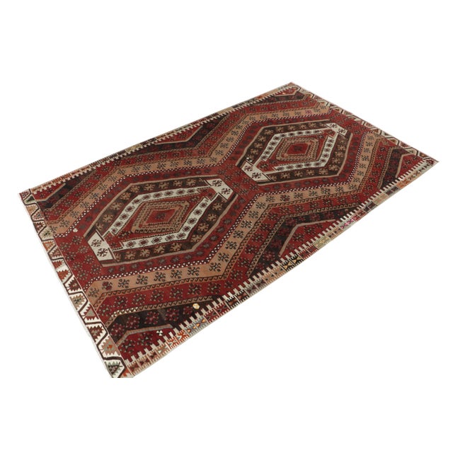 This 8x13 vintage tribal kilim rug remarks a prestigious addition in our flatweave collection. This particular mid-century...
