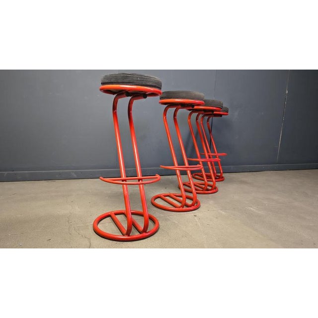 Set of 4 red lacquered metal bar stools with black fabric seat pads. Cool chairs. 1980s - Italy Good overall condition...