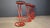 Set of 4 red lacquered metal bar stools with black fabric seat pads. Cool chairs. 1980s - Italy Good overall condition...
