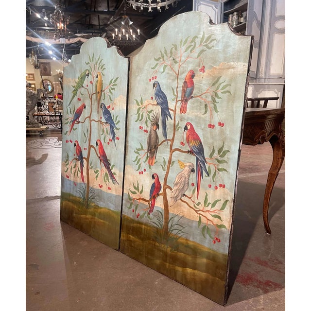 Decorate a living room, bedroom or den with this elegant pair of colorful parrot paintings! Crafted in Italy circa 1960,...