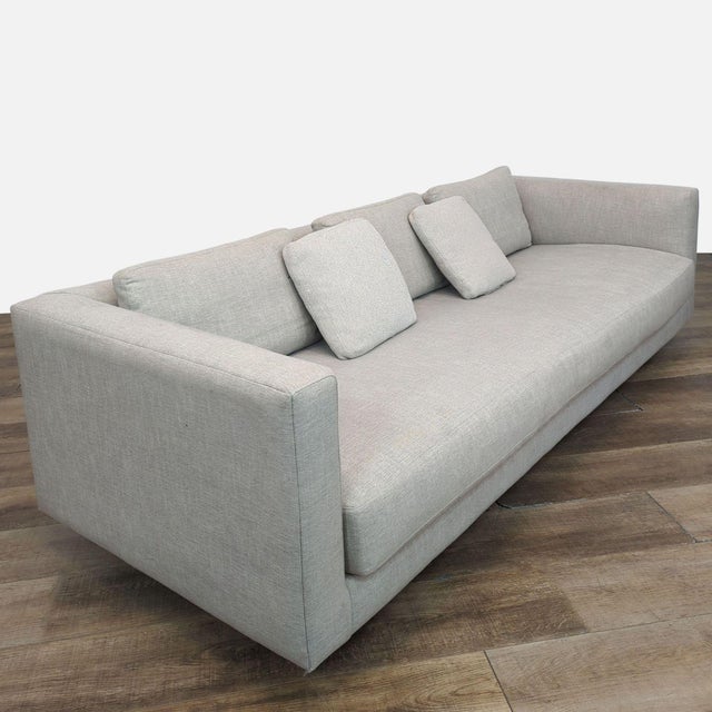 The Hands Down sofa has a single bench cushion, track arms and upholstered in Landa Stone fabric. Brand: Blu Dot. Model:...