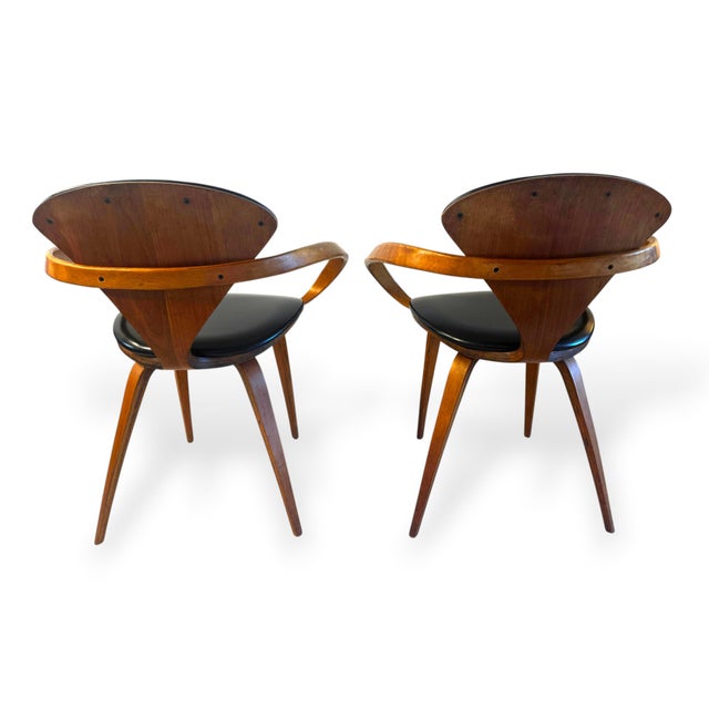 Two original Norman Cherner Pretzel armchairs for Plycraft — one of the most sculpturally arresting designs in the...