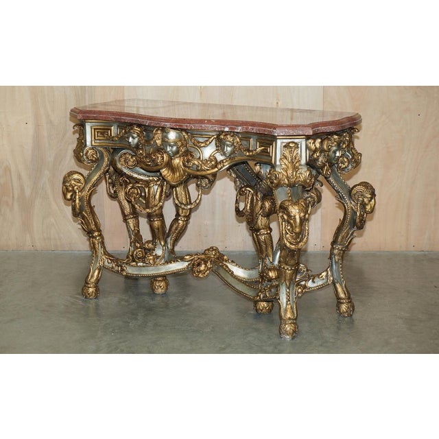 Exceptionally rare, antique metal framed baroque / rococo french console table with the original distressed marble top...