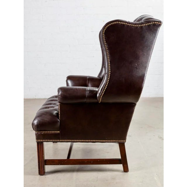 Chesterfield vintage Wingback Armchair w/Tufted Burgundy Leather Dimensions: height 44 1/2in (113cm); width 31in (78.5cm);...