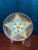 A striking antique Wedgwood Majolica plate featuring an exceptional star-form chrysanthemum design and richly dimensional...
