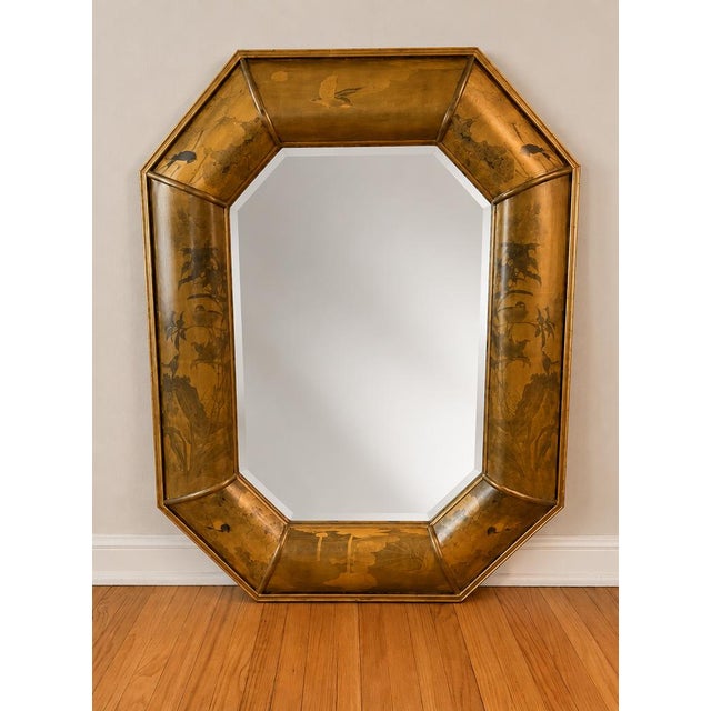 An exceptional large-scale vintage Chinoiserie Asian-style octagonal wall mirror featuring an elegant gilt-finished...