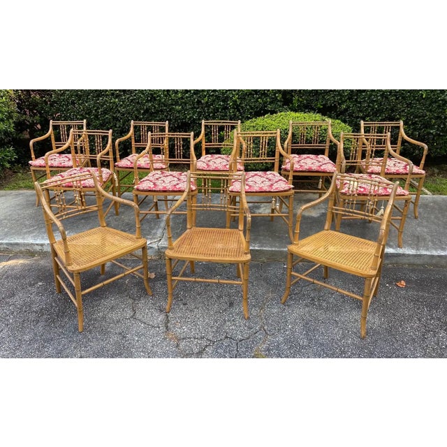 Great set of 12 paint decorated 19th century faux bamboo armchairs with cane seats and custom made cushions.