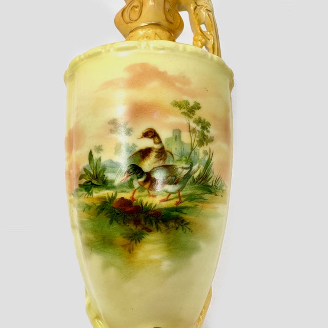 This is a beautiful, authentic antique porcelain ewer crafted by the Robert Hanke factory in Ledvice (Ladowitz), Austria...