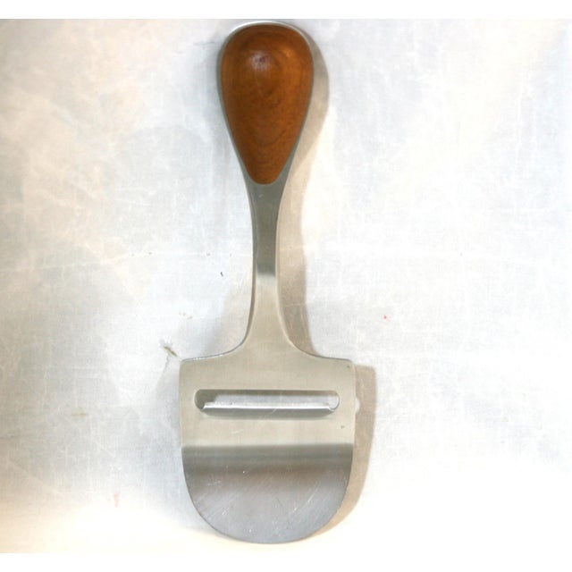 Vintage Dansk Torun Stainless Steel & Teak Cheese Plane Made In Denmark This vintage Dansk cheese plane was designed by...
