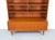 High-quality, two-part bookcase from Denmark. The base cabinet has two doors and adjustable shelves, topped by a hutch...