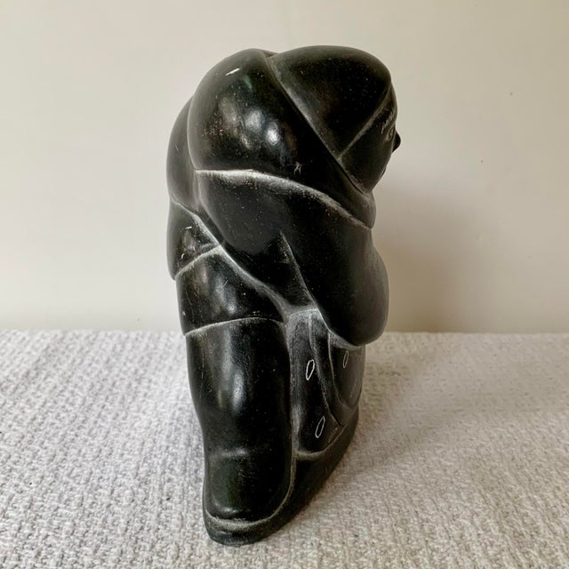 Black Inuit Soapstone Carving by Lucassie Amm – Signed - Kneeling Inuk Figure For Sale - Image 8 of 18