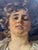 Just an incredible antique oil on canvas. It’s an unusual, intimate portrait of a glance between lovers. The collar of her...