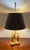 An absolutely stunning vintage Bouillotte table lamp in solid brass. Original shade and finial. This was made in the USA...