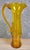 Blenko hand crafted glass pitcher with applied handle. Signed on base "BLENKO". Vibrant yellow color. Excellent original...