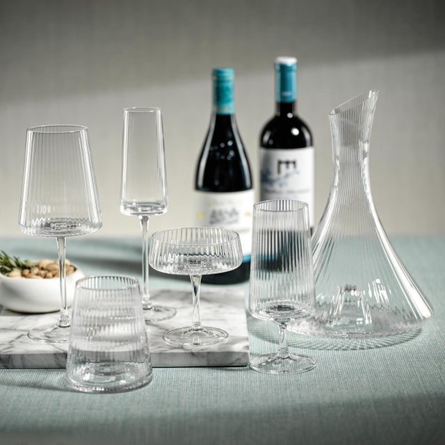 Bandol Fluted Textured Champagne Flute - Set Of 4 The Bandol Fluted Textured Champagne Flute Glass offers a graceful...