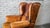 1970s Vintage Art Deco Distressed Cognac Leather Wingback Chair & Ottoman For Sale - Image 9 of 16