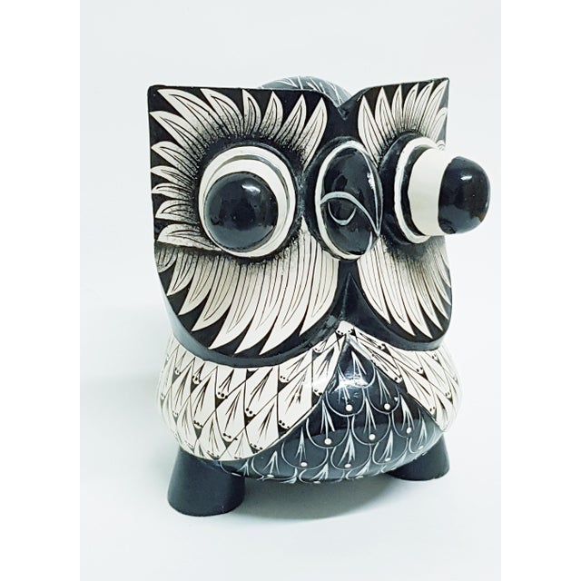 Impressive hand painted monochrome wooden owl with large 3D pupils and highly detailed eye playe. Made of several wood...