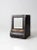 This is an impressive Victorian mercantile tea bin. The large black tin caddy features a beveled glass mirror face with...