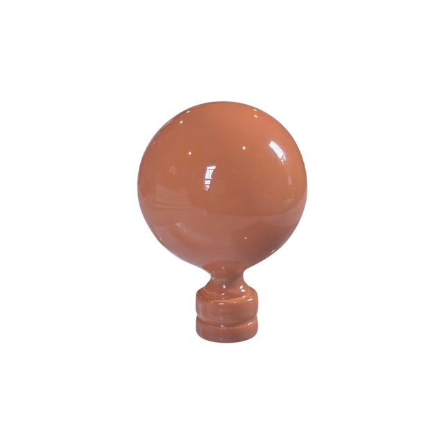 This hand-lacquered lamp finial by Dressing Rooms Interiors Studio features a high-gloss Canyon Sunset finish designed to...