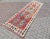 This beautiful, traditional vintage, flatweaved Turkish runner is approximately 60 years old. It is handmade of very fine...