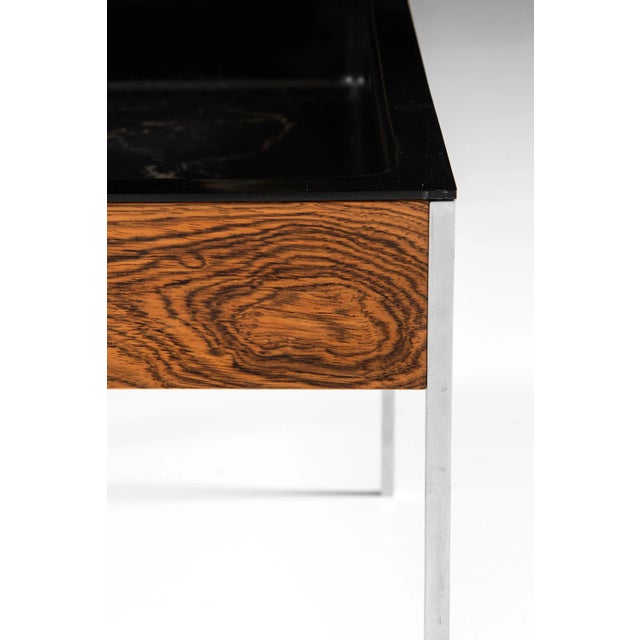 Rare plant stand designed by Uno & Östen Kristiansson. Produced by Luxus in Vittsjö, Sweden. This piece is attributed to...