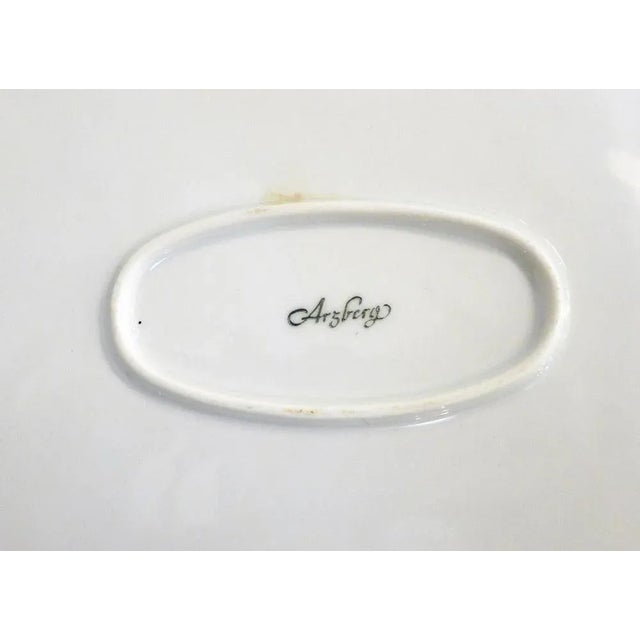 Large service dish (fish) oval in shape White porcelain with a beautiful illustration of a freshwater and algae fish;...