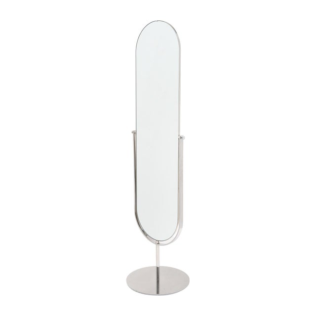 Psyche mirror from the modernist period in France. This piece is made with a chrome structure supported by a round chrome...