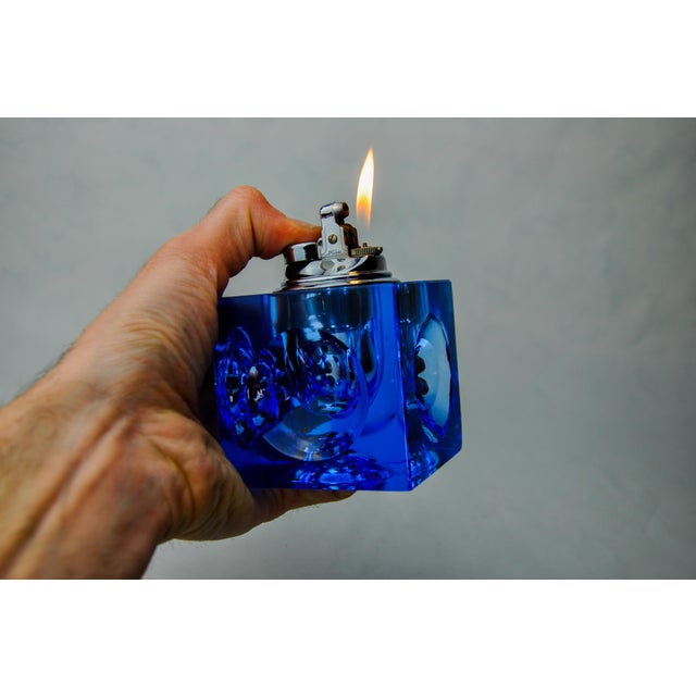 Superb magnifying glass lighter designed and produced by Antonio Imperatore in Italy in the 1970s. Lighter in blue murano...