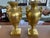 Circa 1950’s reproduction of 19th century urns. NeoClassical French gilt porcelain, stamped Porcelaine De Paris. Urns are...