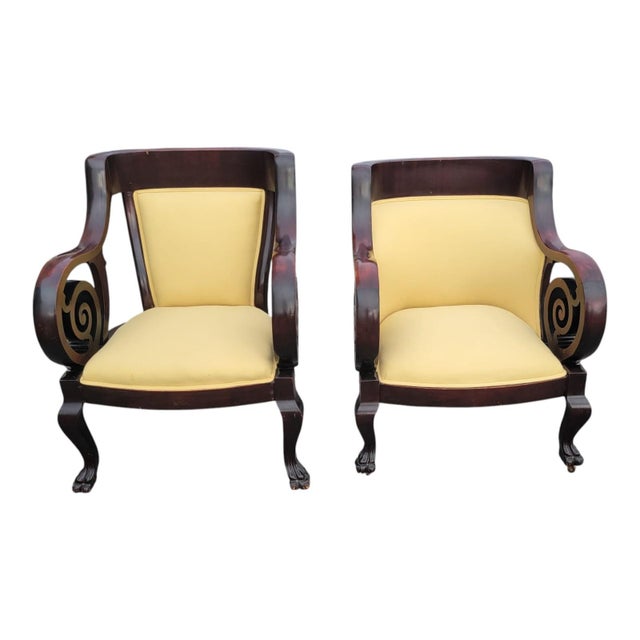 Pair of 1920s Second Empire mahogany salon chairs. Solid hardwood frames with carved scroll arms and cabriole legs....