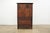 Vintage butler’s secretary desk on chest featuring beautifully figured wood grain, classic brass hardware, and a warm,...